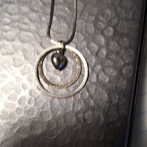 14kt white gold necklace.  Middler has .35 f